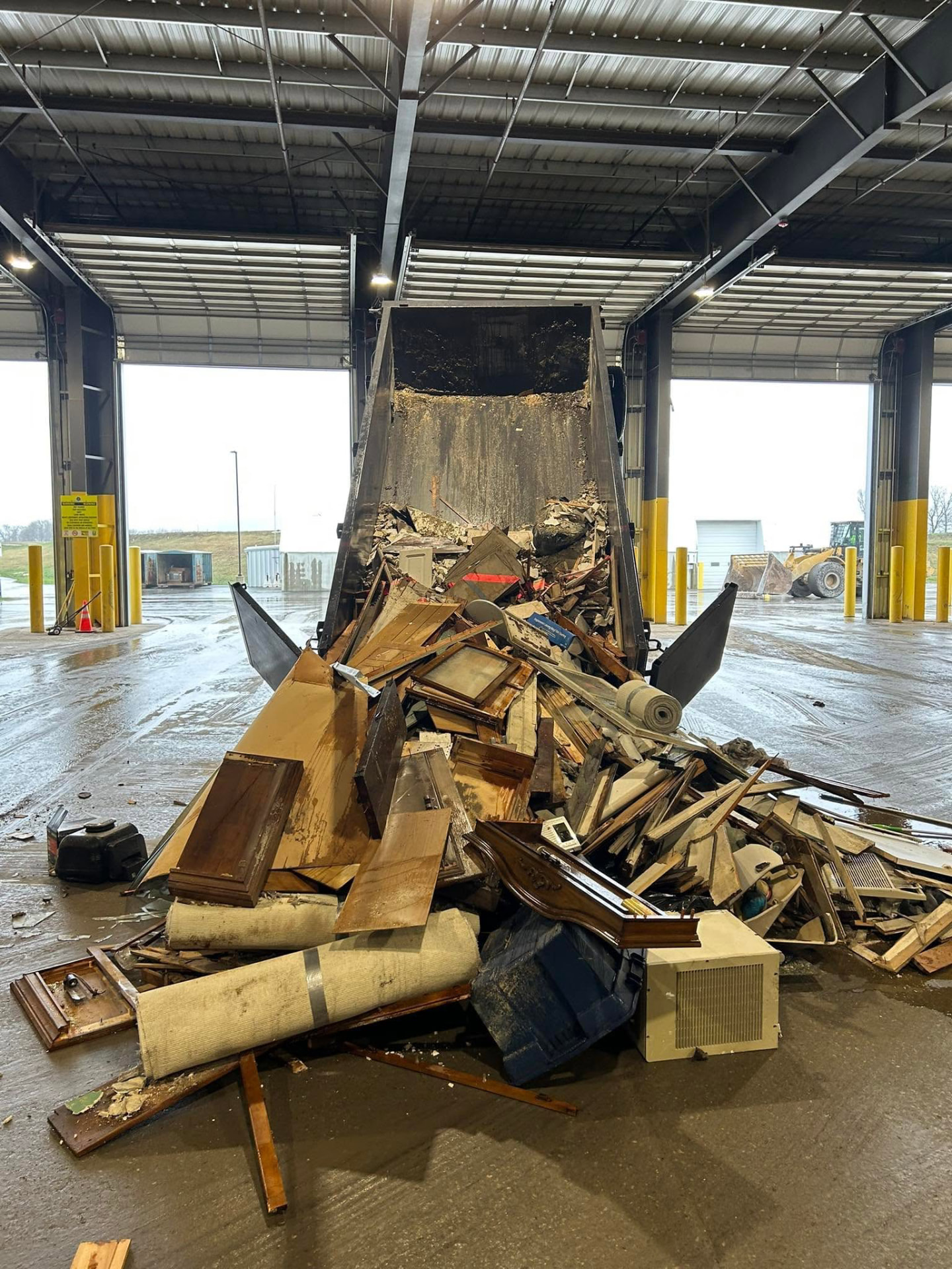 Full load of construction debris and old furniture dumped at the transfer station